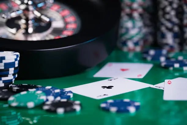 Andar Bahar dealer revealing matching card with both sides visible